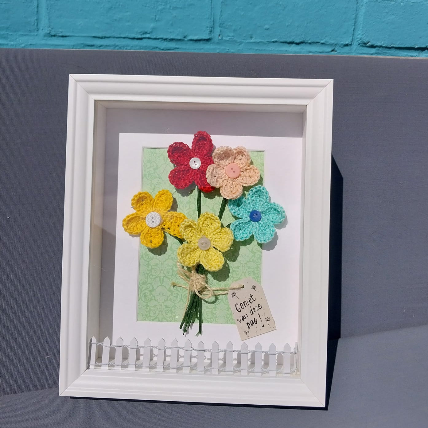 kader met gehaakte bloemen